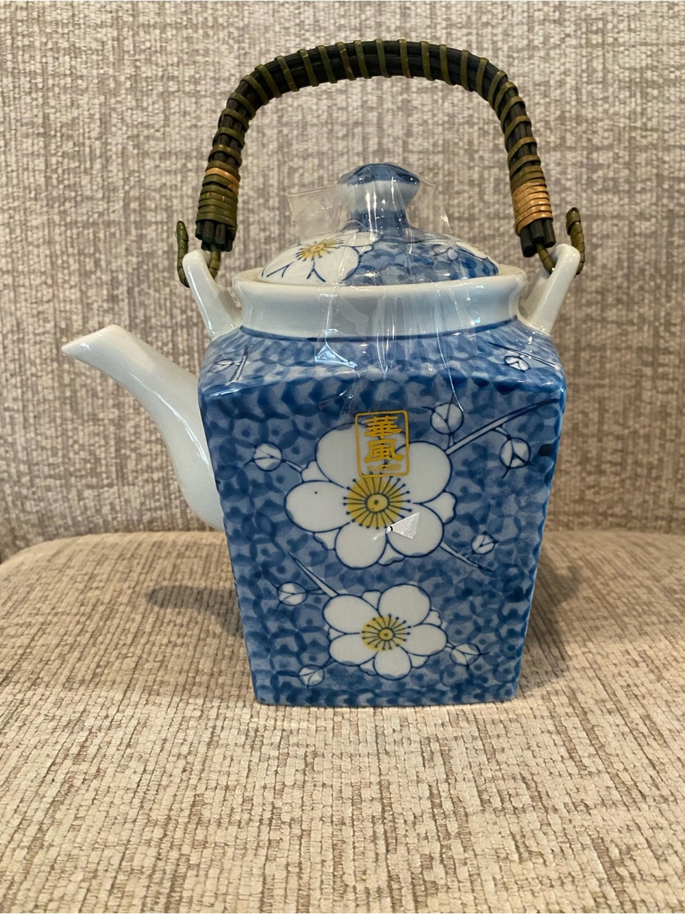 Japanese Floral Porcelain Teapot with Woven Handle